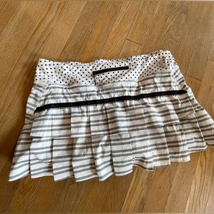 Lululemon tennis skirt - no tags. Size 12 but fits like a 10.